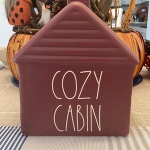 Rae Dunn Cozy Cabin 7 inches Tall by 6 inches Wide